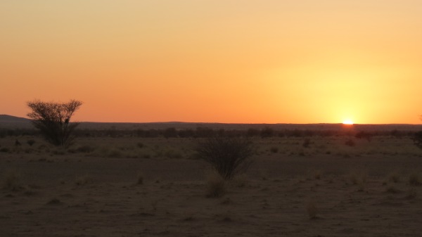The sun sets on the Sahara, and on our tour of Sudan